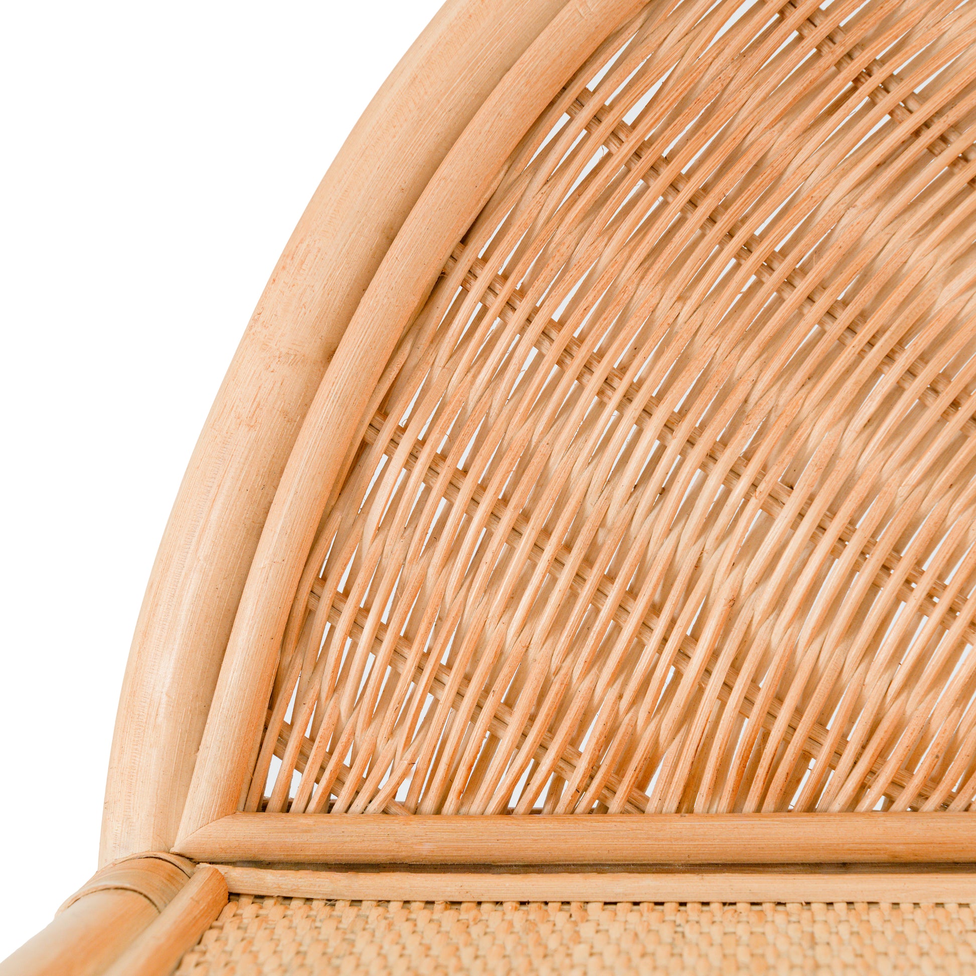 Close-up of a Rattan shelf with curved top on a white background