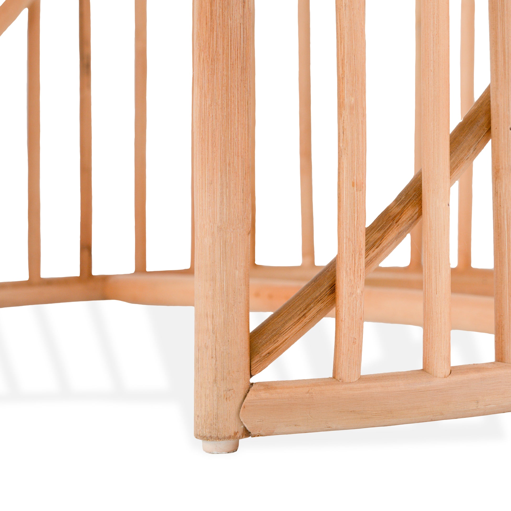 Close-up of a Rattan mirror vanity and stool set on a white background