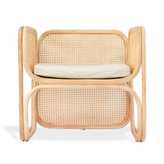 Rattan chair with a white cushion on a white background