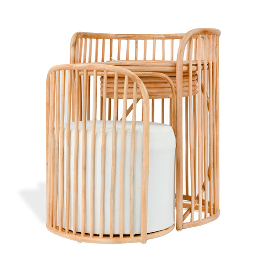 Rattan mirror vanity and stool set on a white background